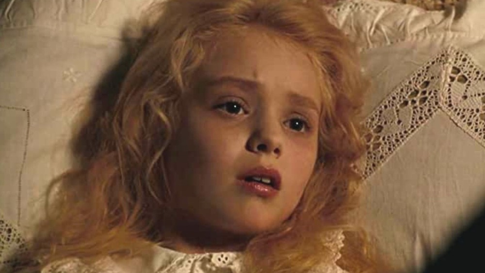 https://www.looper.com/img/gallery/what-young-alice-from-alice-in-wonderland-looks-like-now/intro-1616343617.jpg