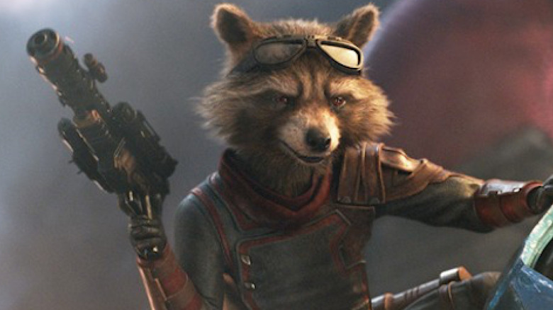 Rocket brandishes a blaster