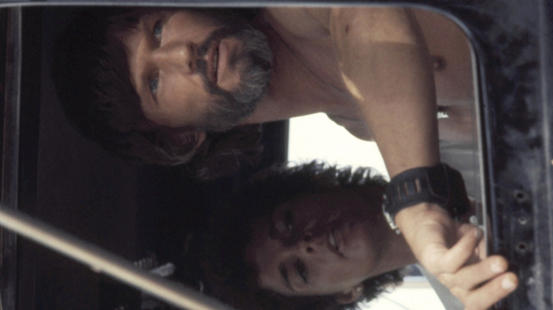 Ali MacGraw rides in a truck