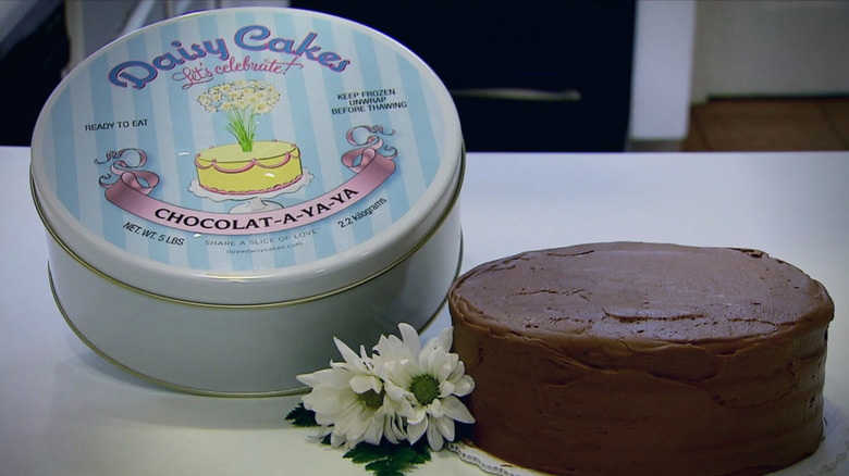 Daisy Cakes displayed on table