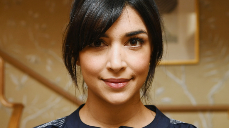 Hannah Simone smiling