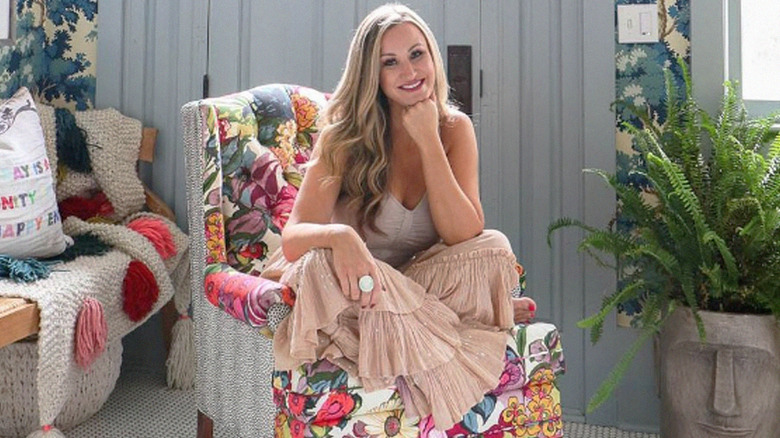 Brittany Palazzo Sitting on Chair