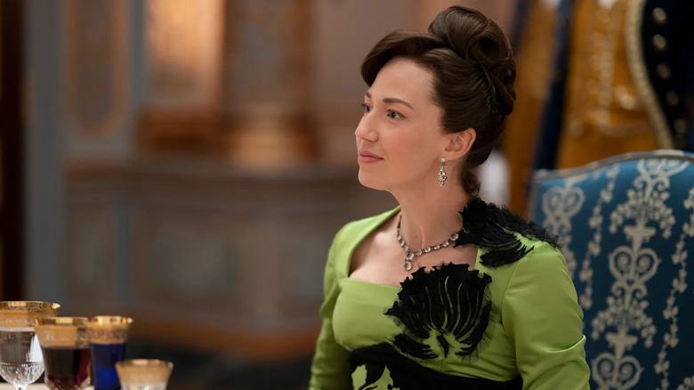 Carrie Coon sits for dinner as Mrs. Russell in The Gilded Age