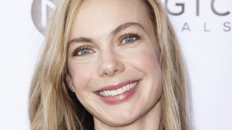 Amanda Walsh smiling at a premiere