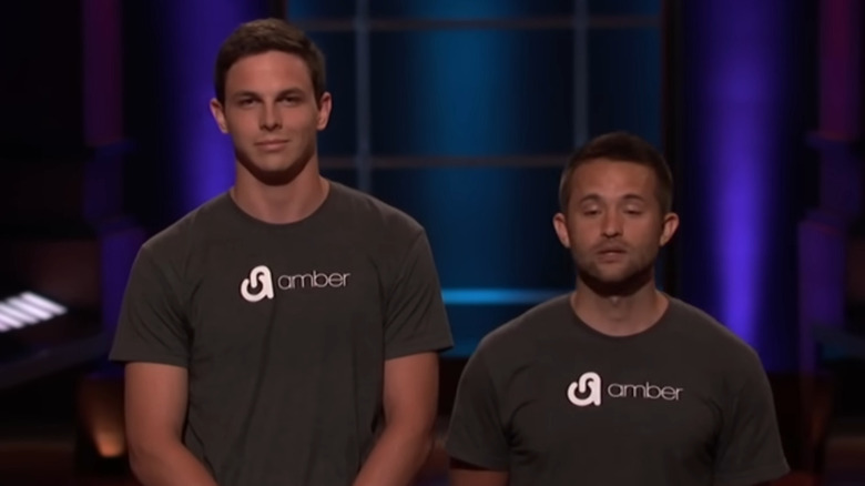 Kyle Byrd and Bill Shuey wearing amber shirts
