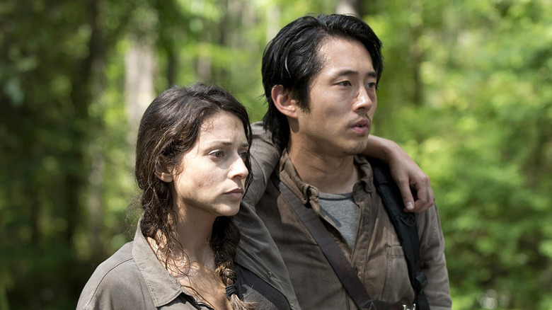 Glenn helping Annie walk 