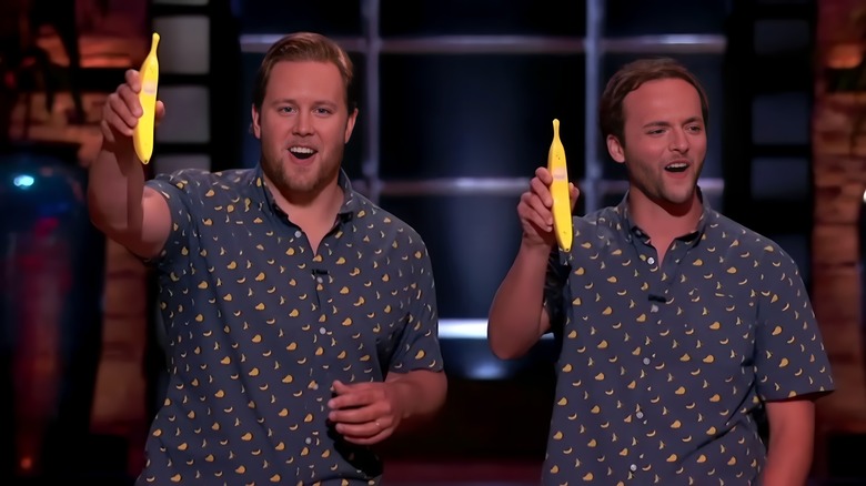 Max and Brian holding up Banana Phones