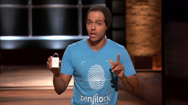 Robbie holding Benjilock and talking