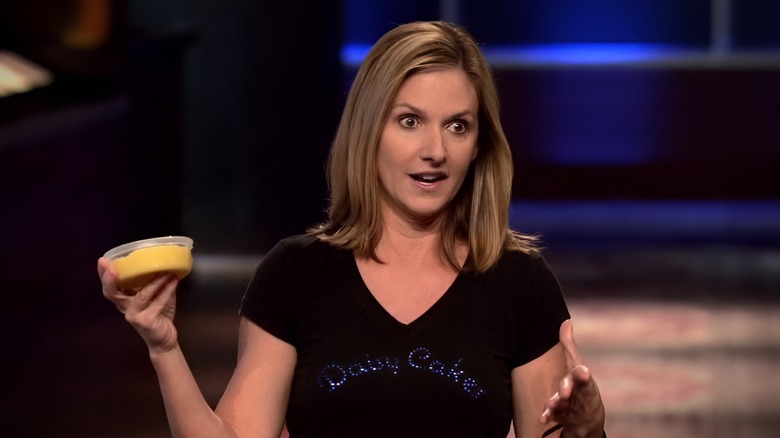 Kim Nelson holding container of custard on Shark Tank