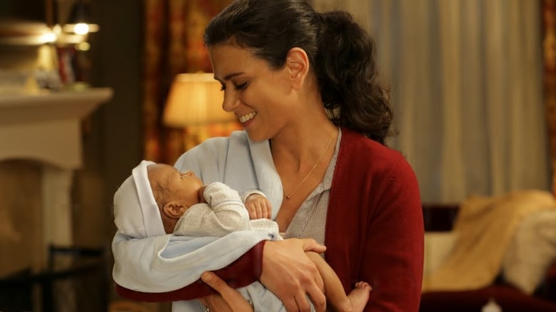 Donna Robbins-Boden holds baby