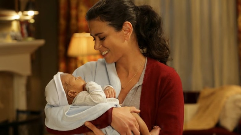 Donna Robbins-Boden holds baby