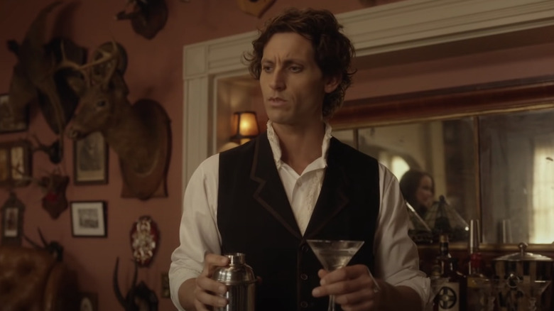 Finn holding martini 