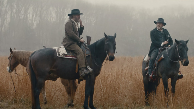 Ketchum and Dugan riding horses