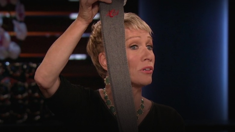 Barbara Corcoran holding a sock