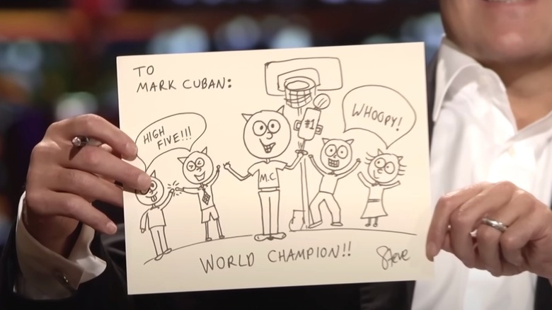 Mark Cuban holding a cat drawing by Steve Gadlin