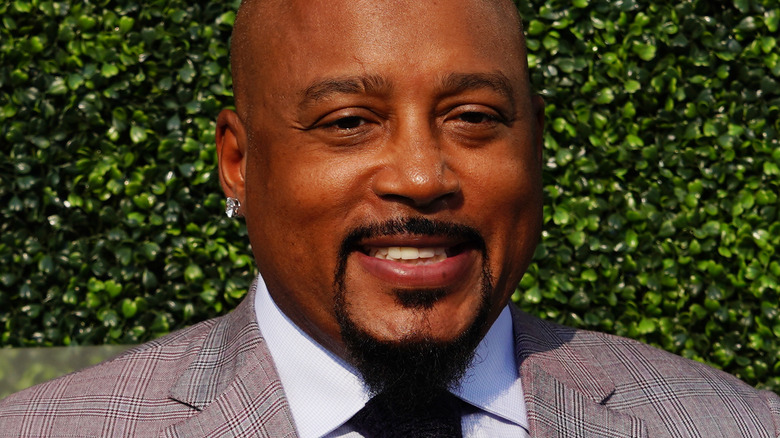 Daymond John Face Leafy Background