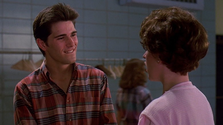 Michael Schoeffling smiling with Molly Ringwald