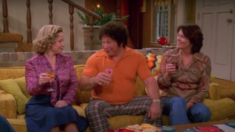 Kitty, Bob, and Joanne drinking on couch