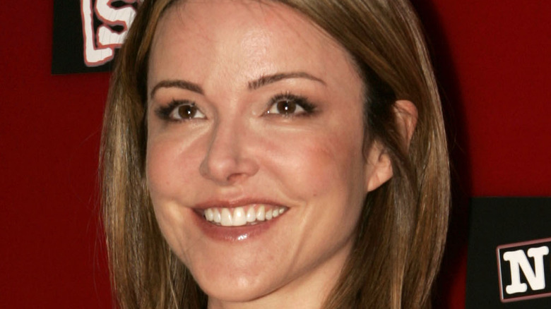 Christa Miller smiles