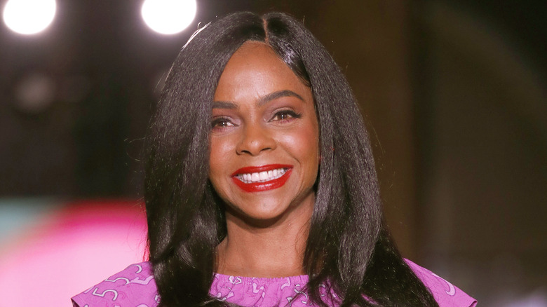 Lark Voorhies smiling in fashion show