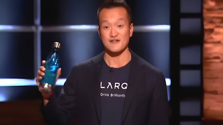 Justin Wang holding LARQ bottle