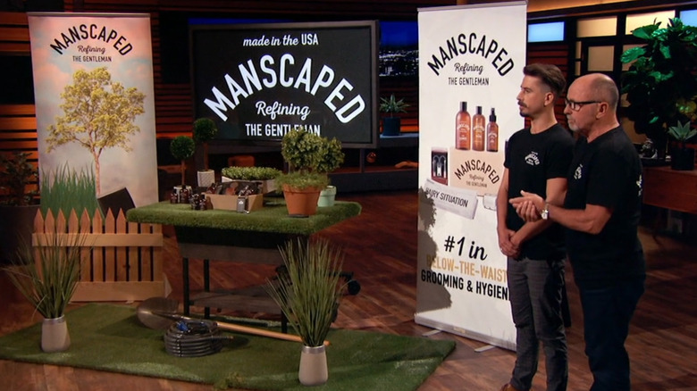 Steve and Josh King standing next to Manscaped display