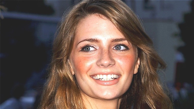 Young Mischa Barton smiling