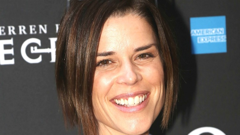 Neve Campbell smiling red carpet