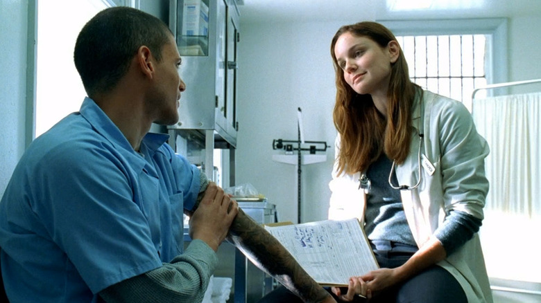 Dr. Tancredi talking to patient