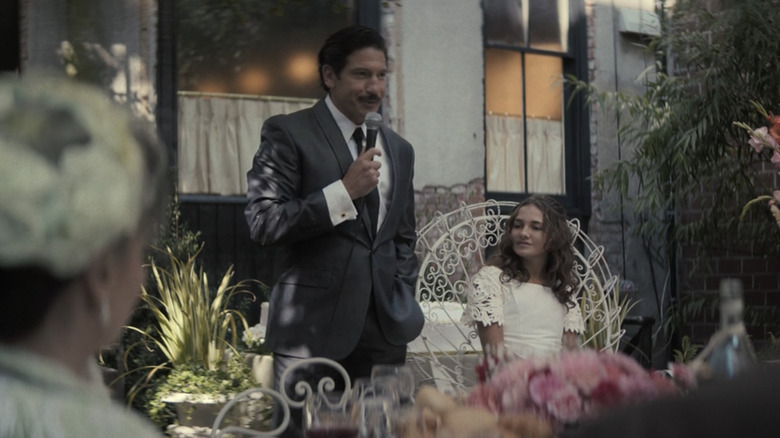 Johnny Soprano smiling at a party