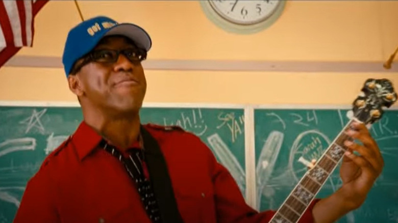 Jaleel White playing a banjo