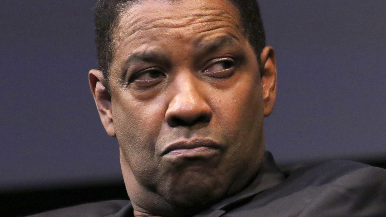 Denzel Washington listens to question