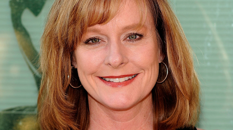 Mary Beth McDonough looks forward, smiles