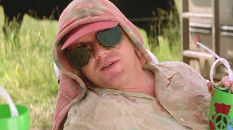 hoffman in goggles and hood holding cup with crazy straw