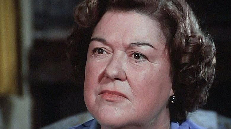 Peggy Rea appears to listen closely