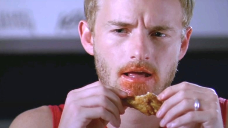 Christopher Masterson eating chicken