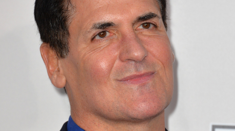 Mark Cuban small smile head tilt