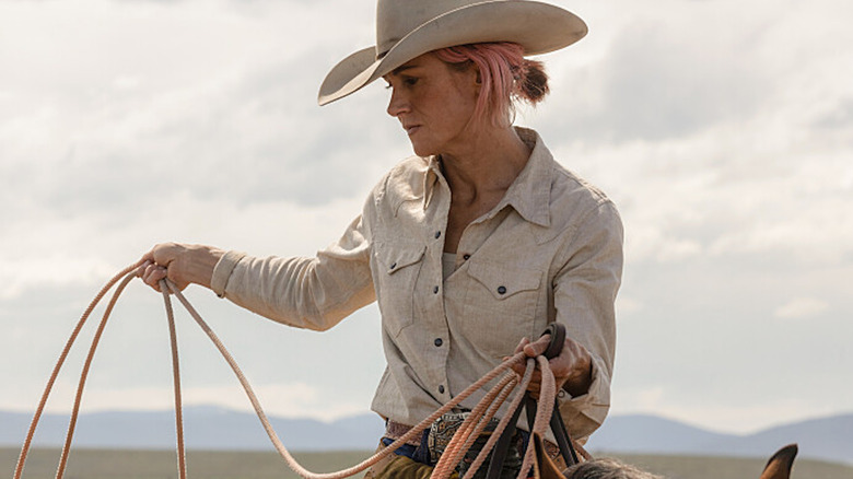 Jennifer Landon holding lasso on a horse 