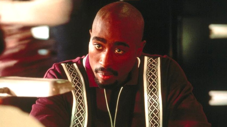 Tupac Shakur as Detective Jake Rodriguez in Gang Related