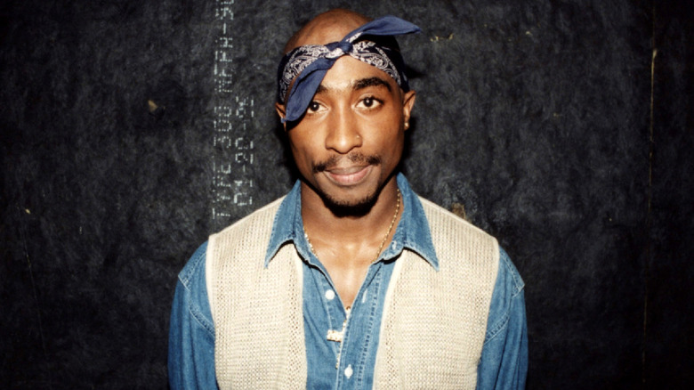 Tupac Shakur posing for a photo in 1994