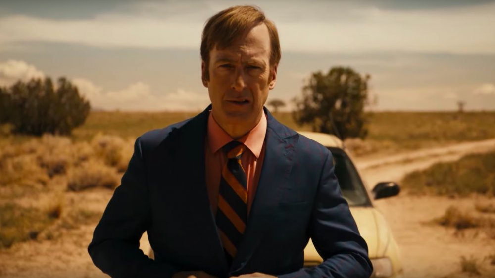 Bob Odenkirk as Jimmy McGill wears a suit in the desert and looks apprehensive in Better Call Saul