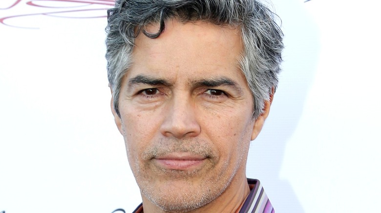 Esai Morales smiles