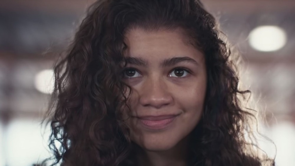 A smiling Zendaya in Euphoria