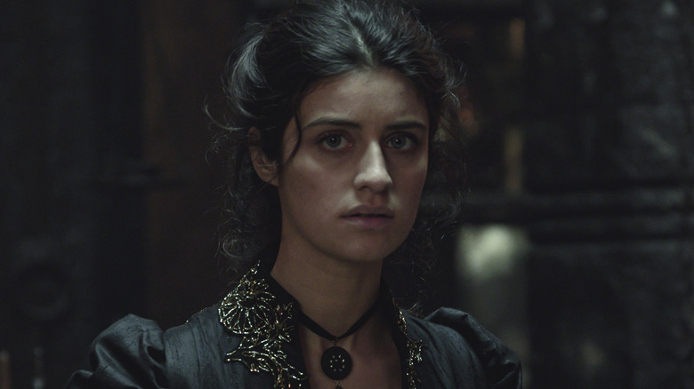 Yennefer staring sadly 