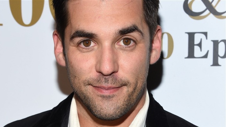 Jordan Bridges on set