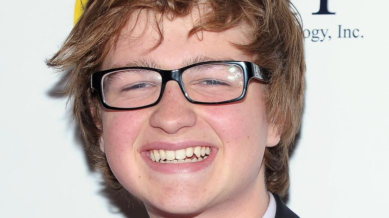 Angus T. Jones smiling