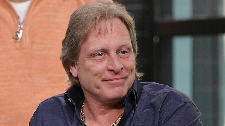 Sig Hansen smiling blue shirt