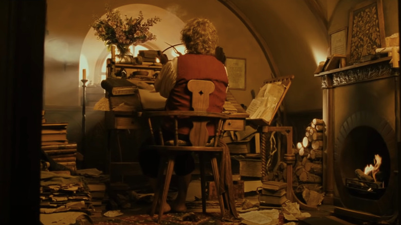 Bilbo sitting in his study