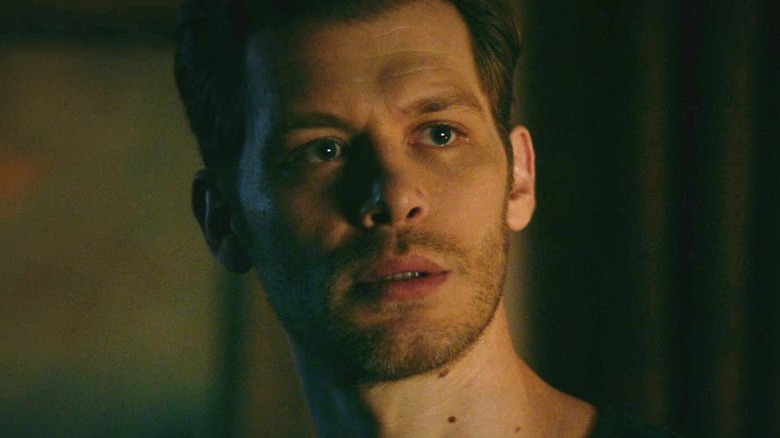 Klaus frowning