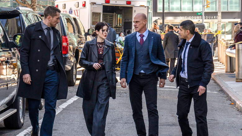 Detectives walking down the sidewalk